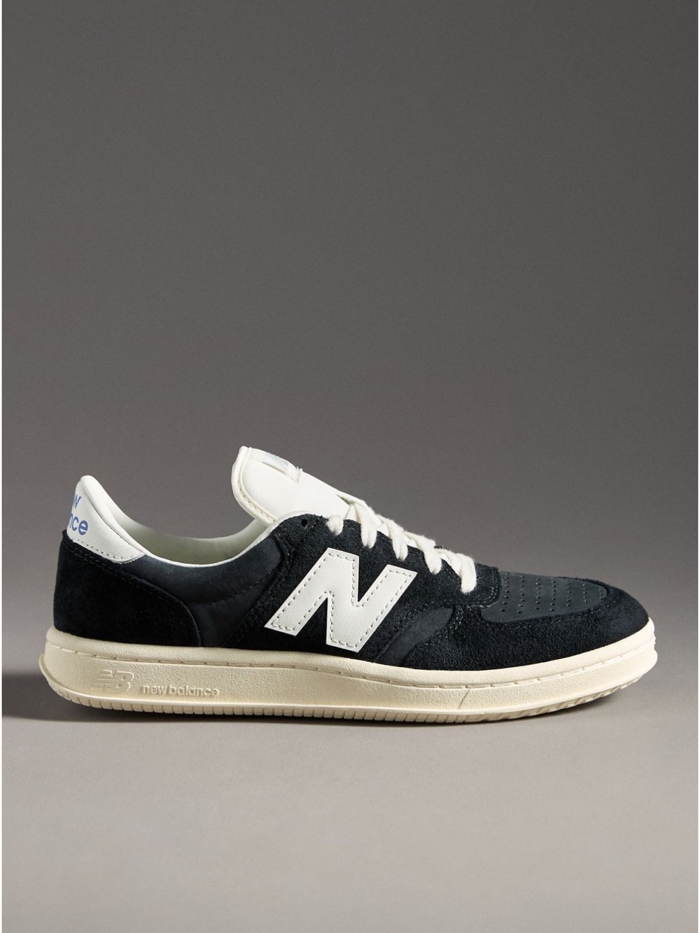 New Balance women’s Black Suede Sneakers with White Logo